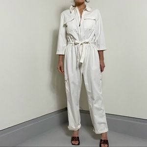 New with tag H&M Jumpsuit. Ivory color. With pockets and zipper in front. Size M